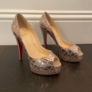 Christian Louboutin Gold Platforms
